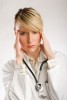 young beautiful woman doctor in stress portrait